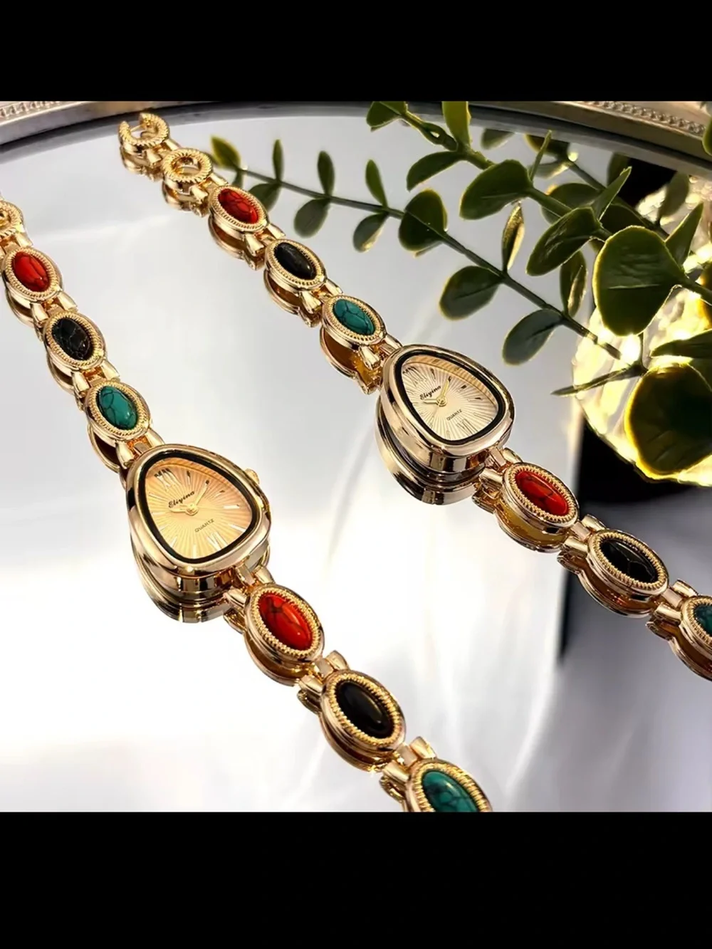 Gold Teardrop Dial Bracelet Watch with Red, Black and Turquoise Accents